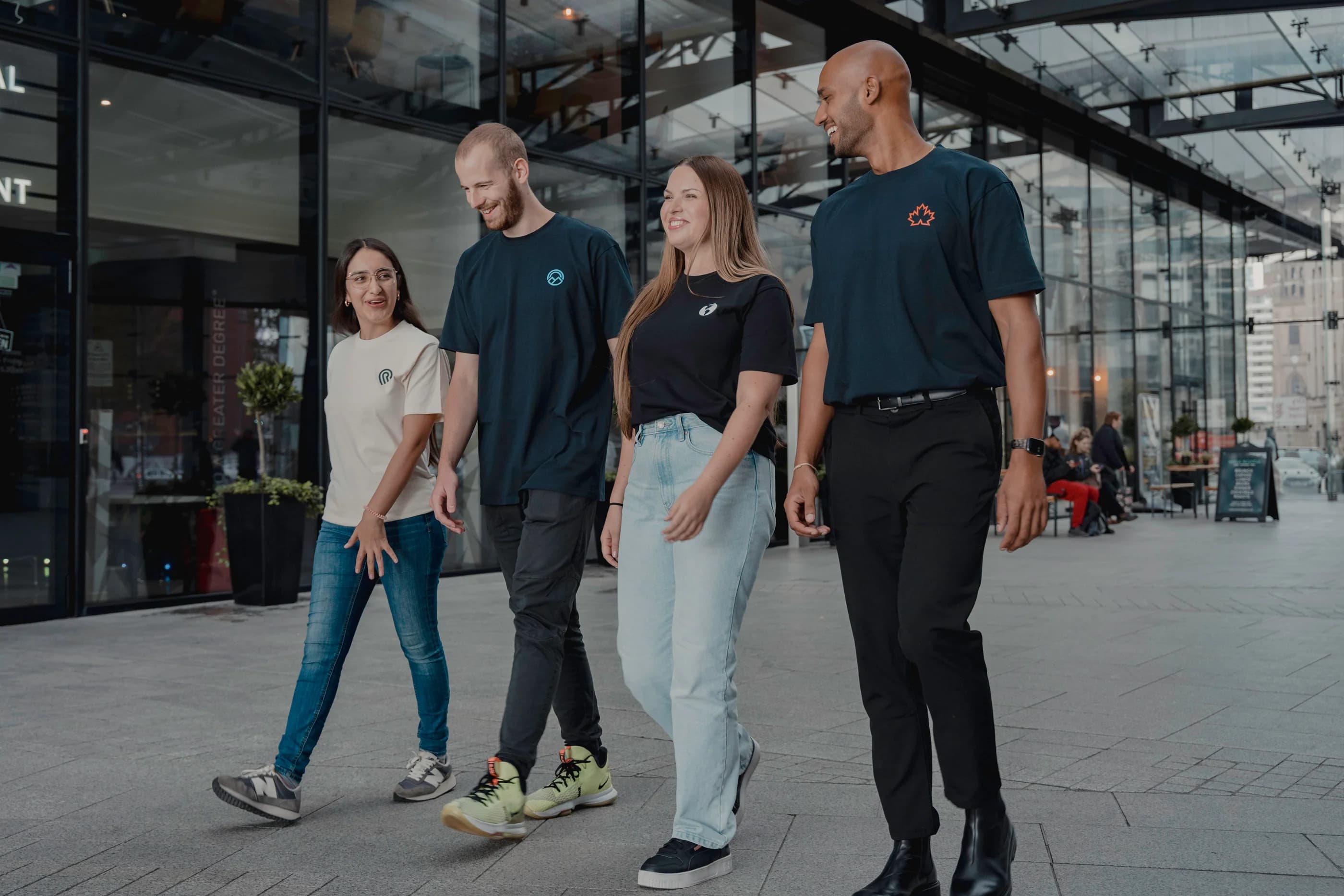 Group wearing branded tees at a conference